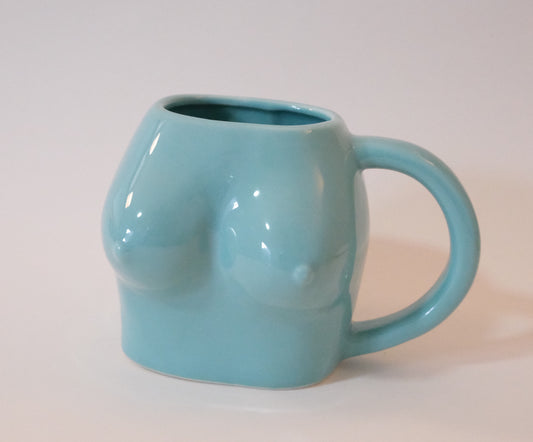 Taza de cerámica en forma de torso