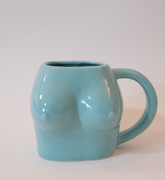 Taza de cerámica en forma de torso