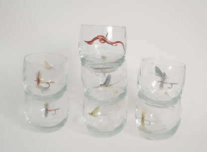 Vasos de insectos y moscas de pesca