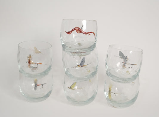 Vasos de insectos y moscas de pesca
